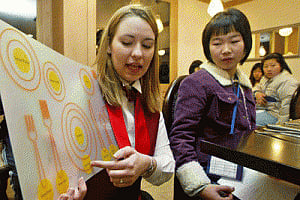 China's job market grows, pressure remains