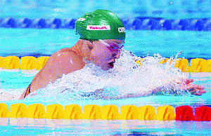 lithuanian teen sets record in swim worlds' 100-meter breastroke prelims