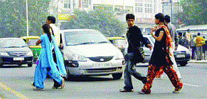 Dividers' height on 65 roads to be raised to rein in jaywalking