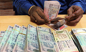 Rupee trades at new low of 64.11 against dollar