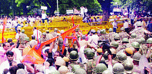 HC frees sants;  BJP lashes SP in  House for ban