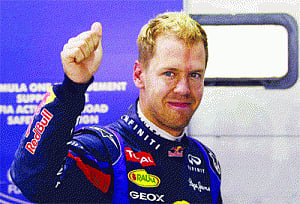 Vettel takes pole