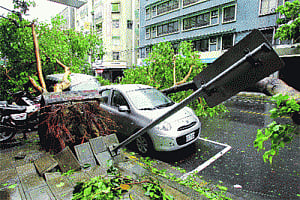 63 killed in China rains as Typhoon Soulik lashes coast