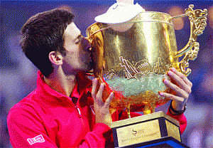 Djokovic wins one, loses another