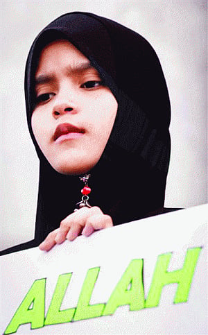 Malaysian court rules non-Muslims cannot use 'Allah'