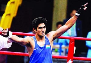 Vijender dominates World C'ships' opener