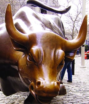 Sensex closes at a new  record high of 21,164.52