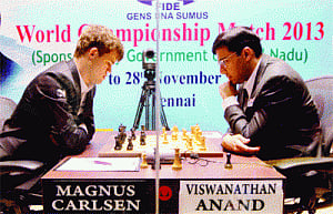 Anand holds off Carlsen