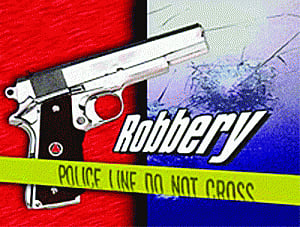 Woman raises alarm during heist, 1 held