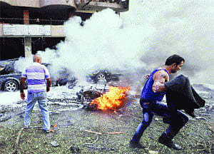 Blasts rock Iran Beirut mission, kill 23