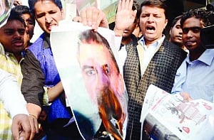 Tejpal booked for 'rape'; Shoma defiant