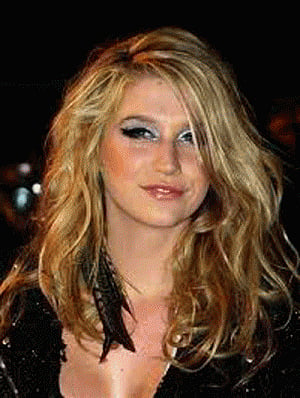 Kesha strips down for Pitbull's video