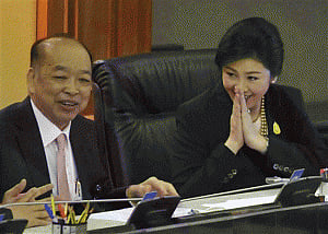 Thai PM easily survives no-confidence vote amid protests