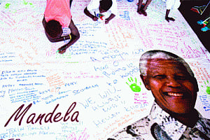 Mandela laid to rest at childhood village