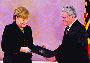 Merkel re-elected to rare third term