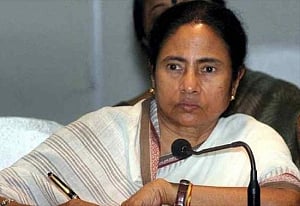 Hit by chit fund scam Mamata faces biggest challenge in 2 yrs