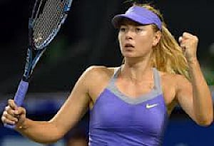 Sharapova survives scare to stay alive