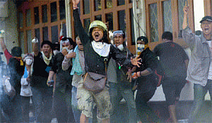Thai court to deliver ruling on poll date, protests continue