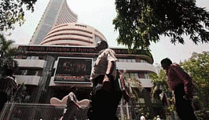 Sensex trades flat during pre-noon session