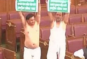 legislators take off their shirts in UP assembly