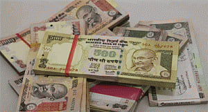 Rupee up 12 paise against dollar in early trade