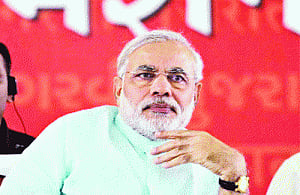 Modi tells Mulayam to tackle UP mess, forget Gujarat