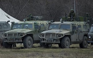 G7 condemns Russia's action in Ukraine, halts G8 preparations