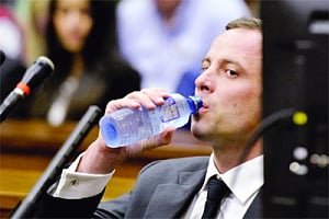 Pistorius pleads not guilty at start of trial