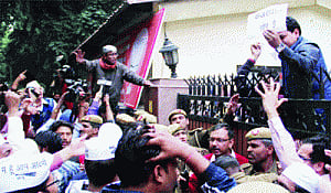 Kejri flouts poll code, AAP men attack BJP offices