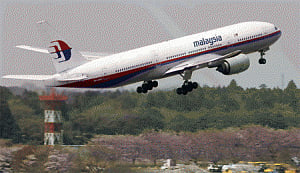 No trace of missing Malaysian plane, stolen passports probed