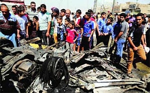 Car bombs in Baghdad, Iraqi town kill 24 people