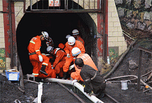 Fate of 22 Chinese workers trapped in flooded mine not known