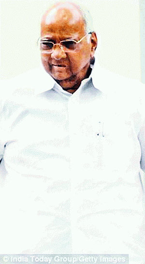 Pawar crushes revolt in NCP, reiterates support for Congress