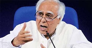 Amit Shah is a murder accused: Sibal