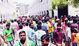 Molester-teacher held after violent protest