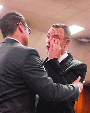 As Oscar trial resumes, neighbour says shooting accidental
