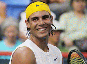 Nadal continues, li Na loses in Madrid Open