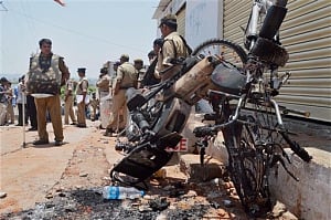 3 killed in police firing as flag burning sparks rioting