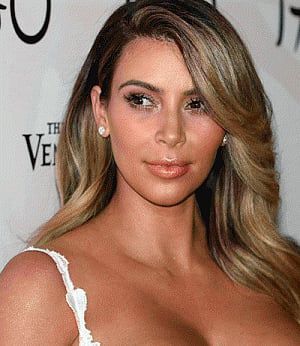 Kim boosts sale of grey wedding gowns