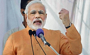 Modi takes up Mumbai hsg society's issue with Maha CM