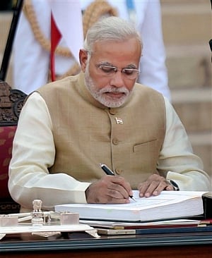 Modi takes charge as PM