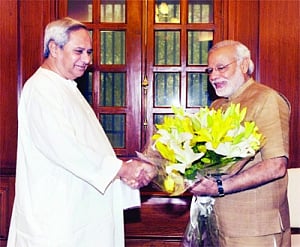Naveen, Chandy meet Modi