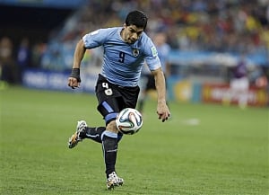 Suarez double sends England on verge of elimination