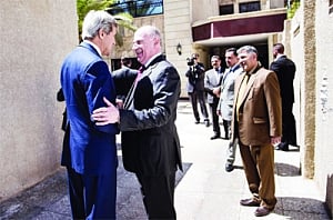 Kerry in Iraq as jehadis seize key town, airport
