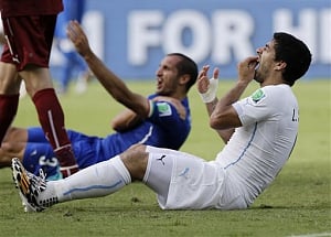 FIFA charges luis Suarez for biting in World Cup