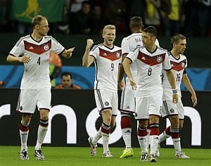 Germany, France strike late, set up World Cup showdown