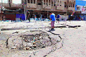 Bombings kill at least 27 in Baghdad