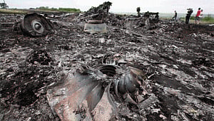 First MH17 crash victim identified: official