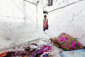 Israel starts withdrawing troops, school attack kills 10