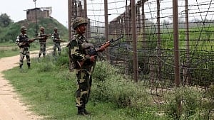 India vows to respond to Pakistani firing
